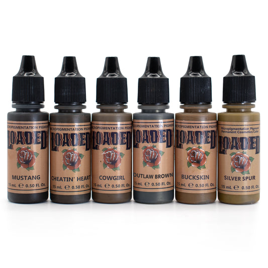 Loaded PMU pigment set featuring six brow tattoo inks including Mustang, Cheatin’ Heart, Cowgirl, Outlaw Brown, Buckskin, and Silver Spur.