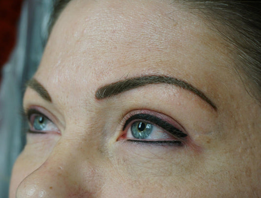 Permanent makeup eyebrow results created with a 50 percent Mochaccino and 50 percent Soft FX pigment blend.