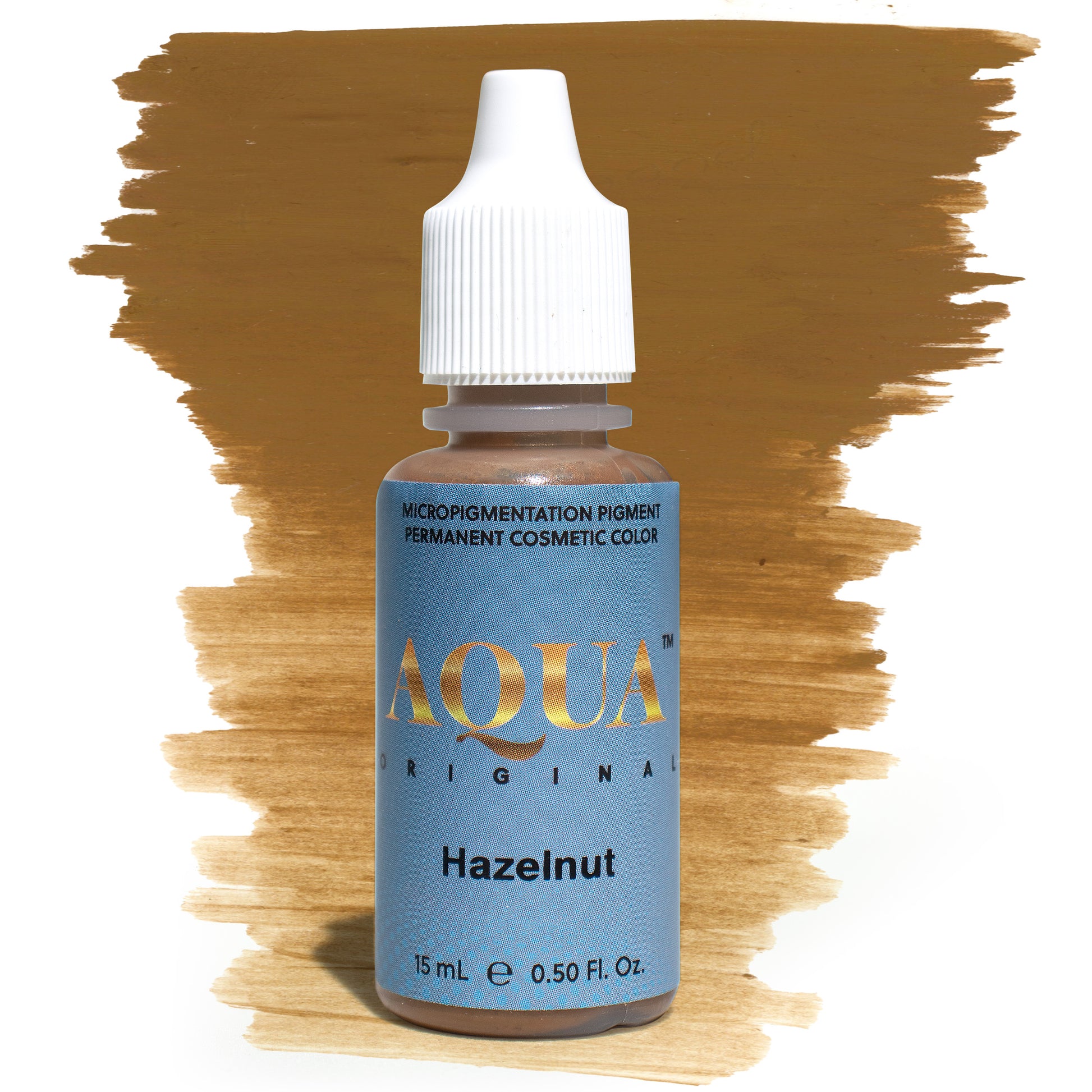 Product photo of Aqua Original Hazelnut pigment bottle with a warm brown brushstroke background. A medium, neutral-brown pigment perfect for brows and eyeliner procedures. Part of the Aqua Original pigment line by Girlz Ink, known for its smooth saturation and natural-healed results