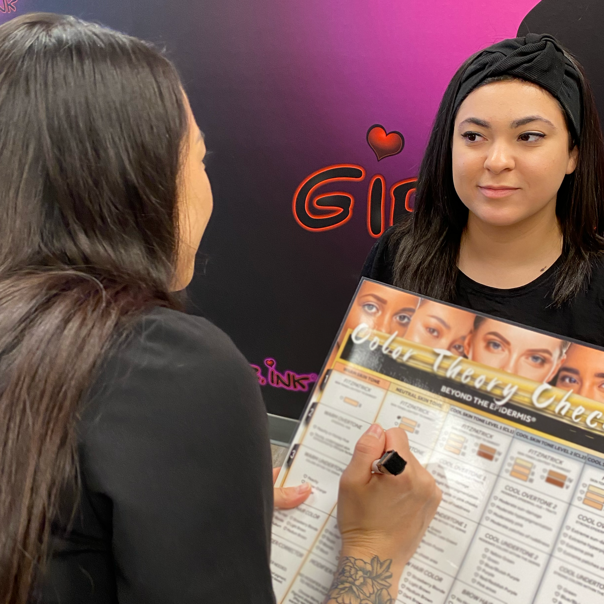 PMU artist using the Beyond the Epidermis Color Theory Checklist during training at Girlz Ink studio