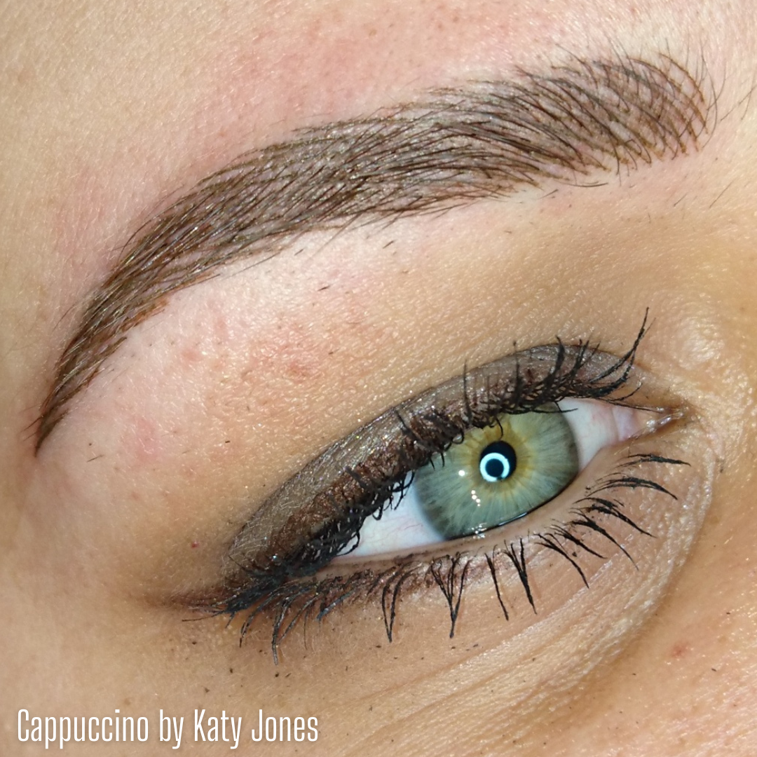 Close-up of a healed eyebrow created with Cappuccino from the Li Pigments Aqua collection by artist Katy Jones. The pigment produces a soft light brown tone with neutral undertones, ideal for clients with fair to medium skin tones seeking natural permanent makeup brows.