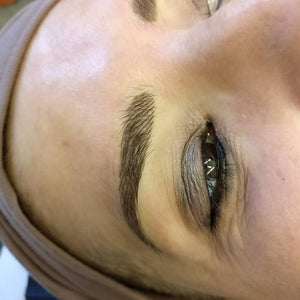 Healed permanent makeup brows using Eboni Express pigment, soft natural brown PMU eyebrow results after healing, created by artist Naomi Waite with professional PMU pigments.