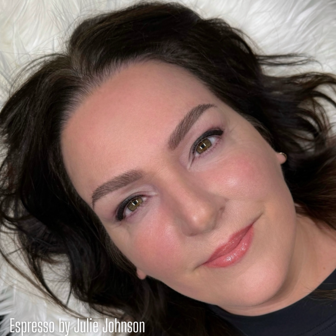 Close-up of healed eyebrow results created with Espresso from the Li Pigments Aqua collection by artist Julie Johnson. The pigment produces a rich, neutral dark brown tone that complements medium to dark hair for soft, natural-looking brows.