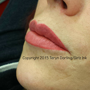 Healed lip tattoo result using Berry Persistent pigment by Teryn Darling.