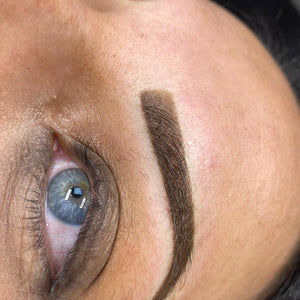 Permanent makeup brows using Rich Brown pigment modified with Olive Mod, created by Aliki Chrysiliou.