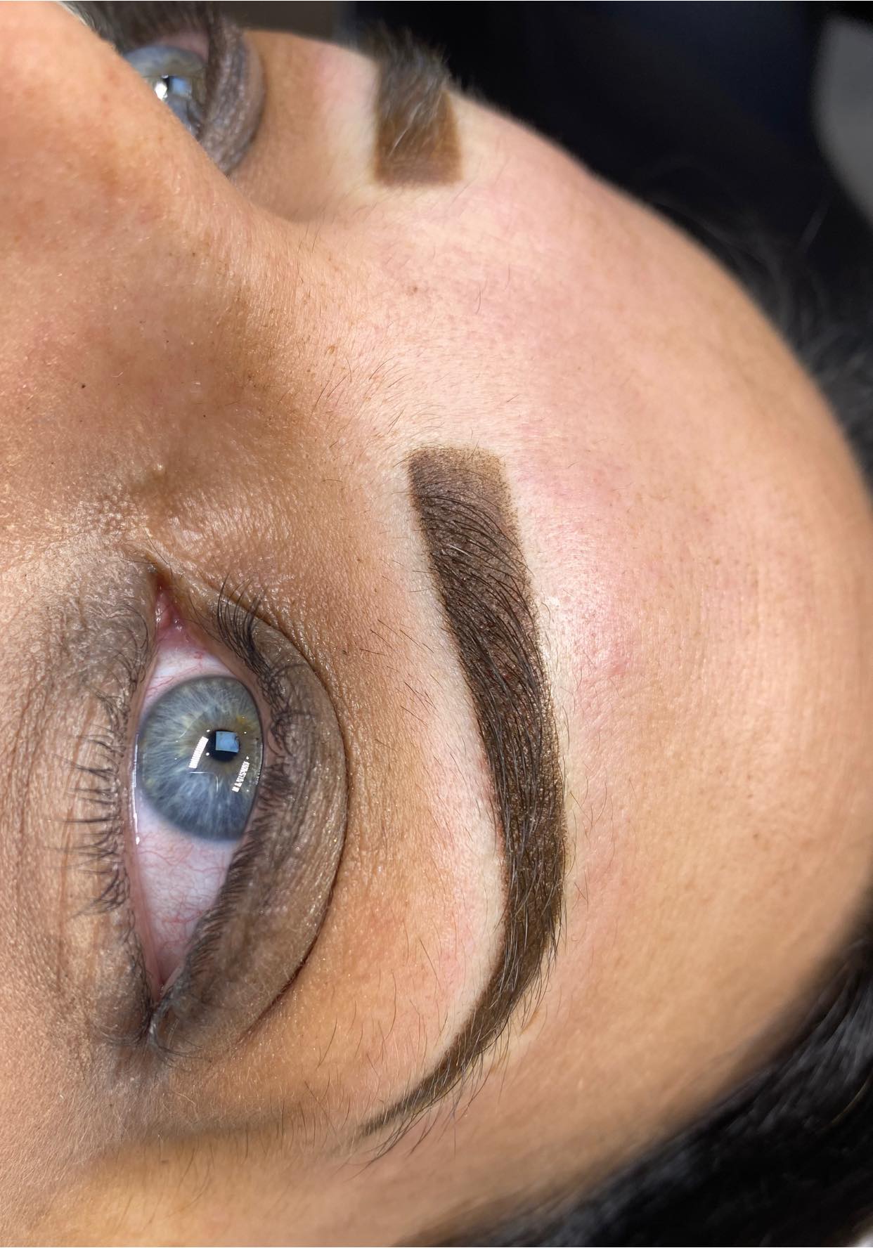 Permanent makeup brows using Rich Brown pigment modified with Olive Mod, created by Aliki Chrysiliou.