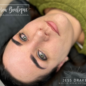 Client with perfectly defined brows created using Rich Brown pigment from the Li Pigments Aqua collection. PMU artist Jess Drake of Brow Boutique achieved a bold yet natural healed finish ideal for brunettes and medium-to-dark skin tones.