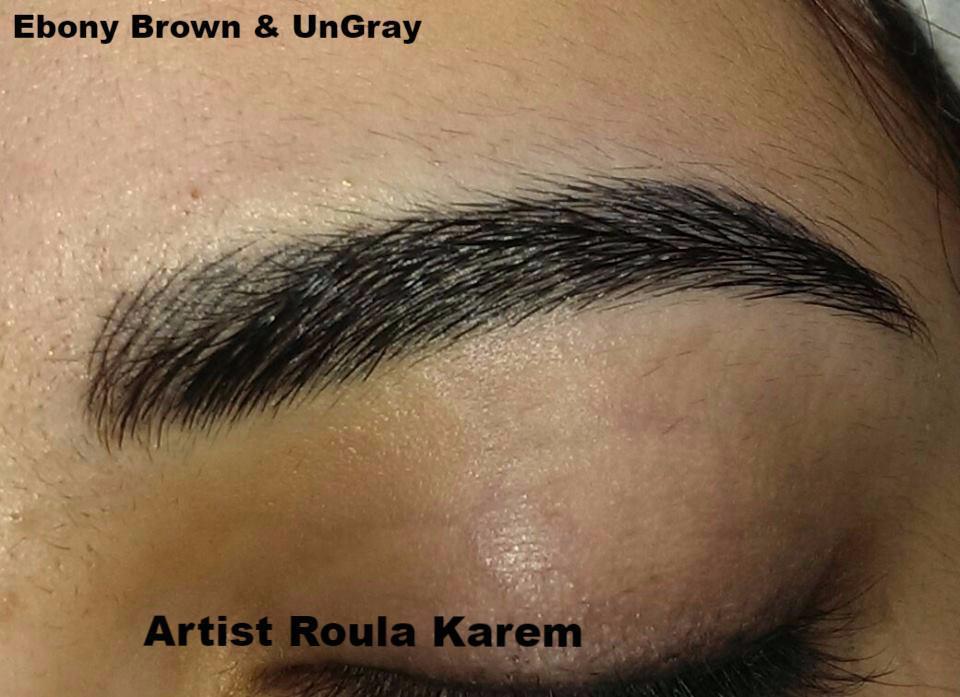 Healed brow using Aqua Ebony Brown and UnGray on a client with medium skin tone, done by artist Roula Karem.