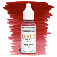 Bottle of Aqua Global Fine Wine PMU lip pigment with a rich red brushstroke background. Deep burgundy tone for bold, sophisticated permanent lip color.