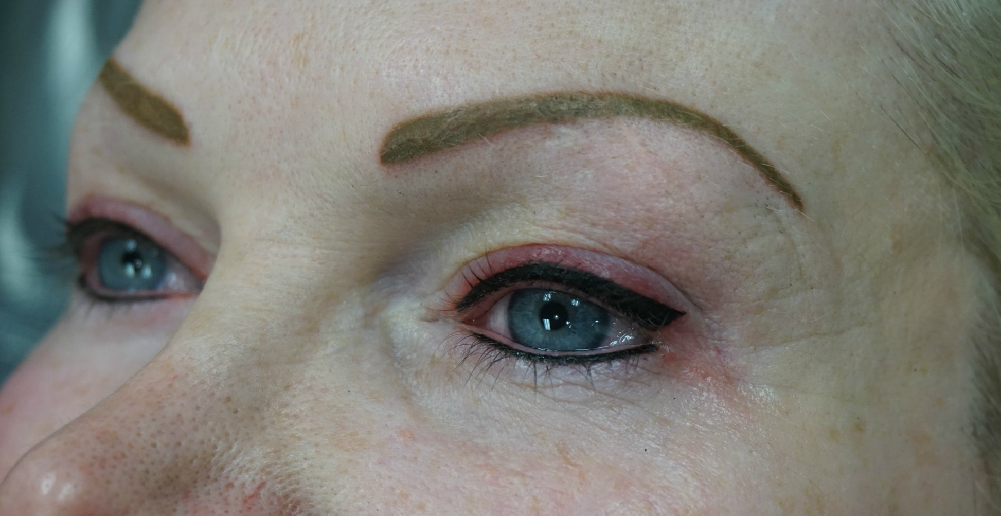 Eyebrows mid-correction using Aqua Yellow Olive Mode pigment to neutralize old blue tones.


