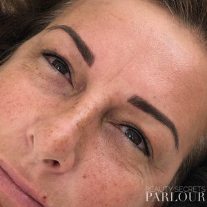 Eboni Express healed eyebrow tattoo by Riona Gold, showcasing a defined yet natural look for PMU clients.