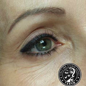 Healed eyeliner correction using Aqua Midnight Black by Girlz Ink artist Teryn Darling.