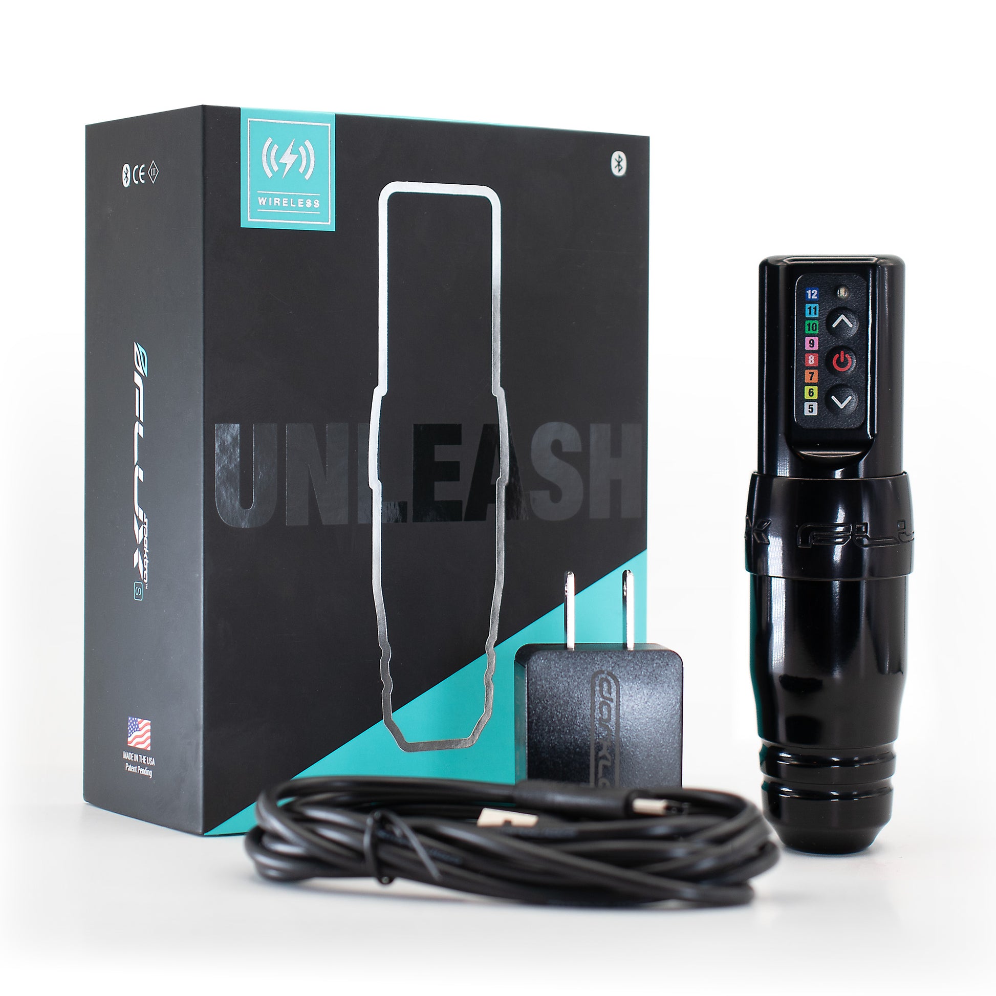 Flux S wireless permanent makeup machine in black by Microbeau, shown with box, charger, and cable on a white background. Professional cordless PMU device for precision tattooing.