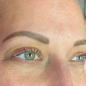 Fully healed brow work showing golden tone using Li-Pigments-Loaded Gold Dust PMU pigment found at Girlz Ink.