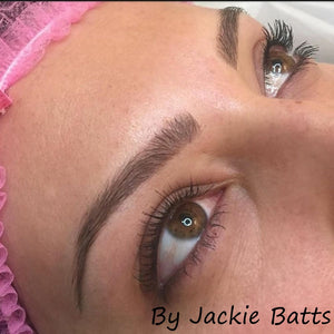 Healed hairstroke brows by Jackie Batts using Aqua Chocolate Truffle, creating a realistic, medium-brown brow ideal for clients wanting subtle structure and depth.