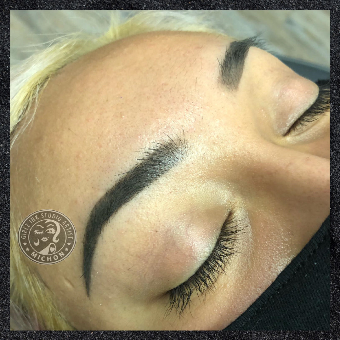 Healed Maverick brows by Michon, applied on deep skin tone showing bold saturation and definition.
