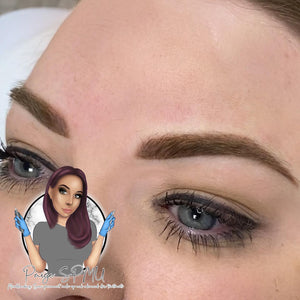 Healed brow results using Loaded Saddle Brown pigment by Paige Lloyd, showing soft, natural ombré finish on light skin.
