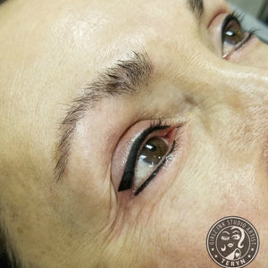 Fresh permanent eyeliner created using Li Pigments Black Diamond from the Aqua Line by Teryn Darling of Girlz Ink, showing a crisp black winged line with rich color saturation and smooth healed skin.