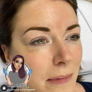 Healed brow results using a mix of Loaded Maverick and Smoke pigments on medium skin tone.