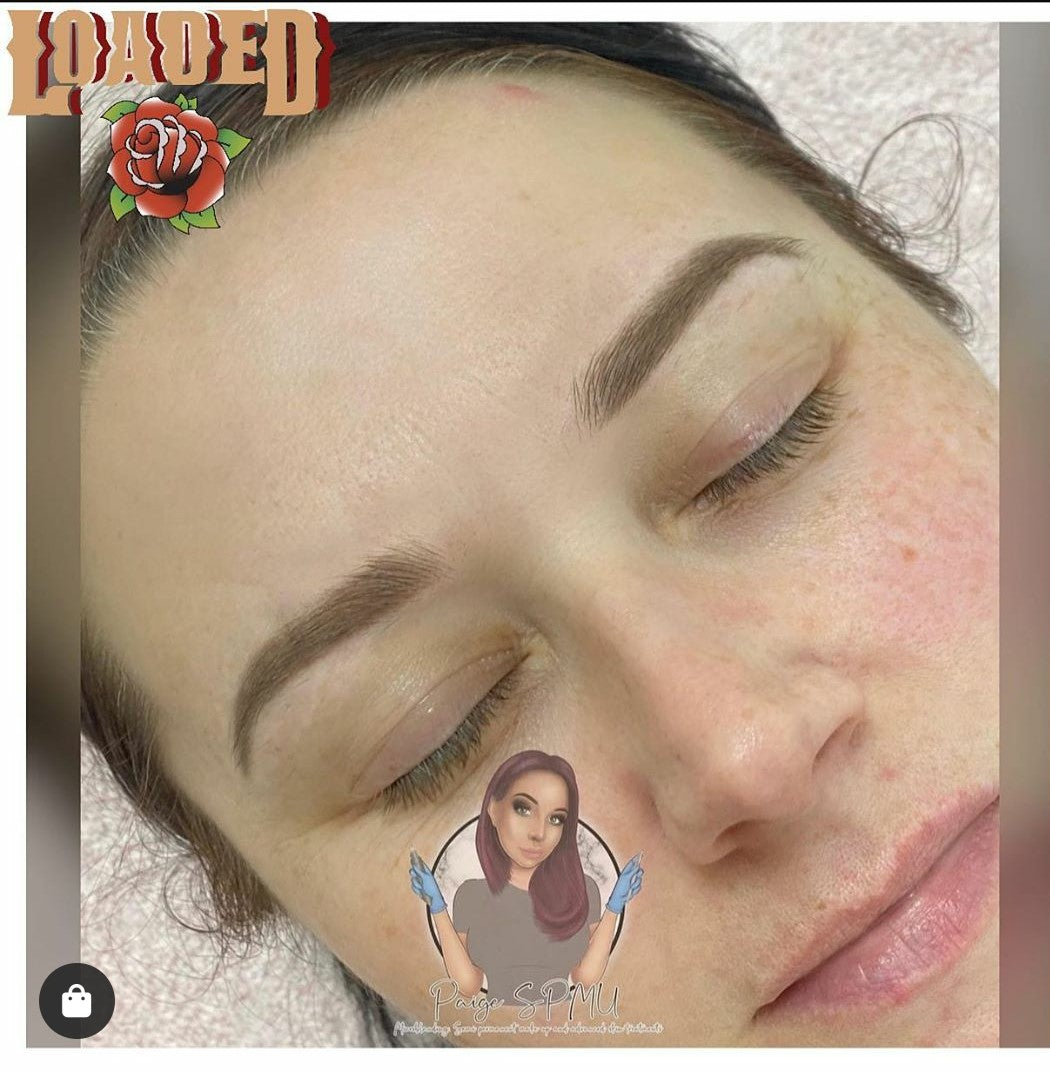 Bottle of Loaded Pigment in Saddle Brown, a warm medium-brown pigment ideal for natural-looking healed brows.
