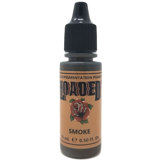 Bottle of Loaded Pigment in the shade Smoke, a deep cool-toned black pigment ideal for PMU eyeliner.