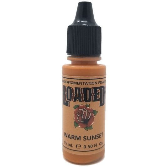 Bottle of Loaded Warm Sunset pigment used as a warm modifier for brow color correction.