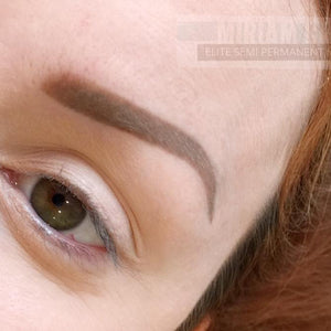 One session healed color correction over old gray brows using Milk Chocolate pigment by Miriam Grice.

