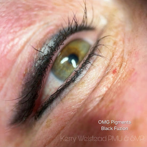 Fresh permanent eyeliner using OMG Black Fuzion pigment by Kerry Welstead, showing bold black color and precise application immediately after procedure.