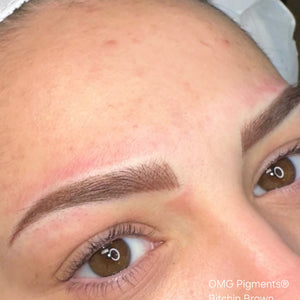 Close-up of freshly microbladed brows using OMG® Pigments Bitchin Brown by iBrowDesigns.Ink. The image shows crisp, defined strokes and soft brown color suitable for healed PMU brow results.