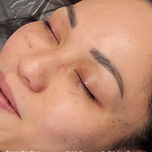 Healed brow tattoo results 1.5 years after one session using OMG® Pigments Bitchin Brown by Teryn Darling. The photo shows smooth color retention and natural brow definition on healed skin.