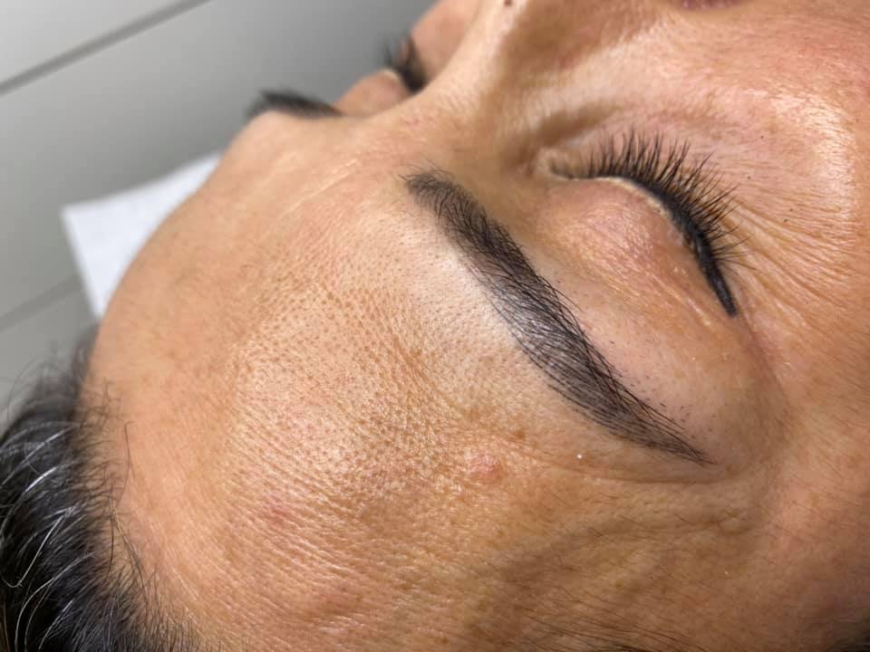 Custom PMU brow color mix using Cheatin’ Heart, Outlaw Brown, and Whiskey Brown pigments by Melanie KT, showcasing warm brown healed results.