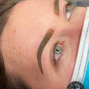 Healed ombré brows created with Saddle Brown pigment from Loaded, done by Amber at Girlz Ink Studio.