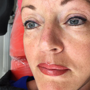 Permanent makeup lips by Lorraine Thompson using Toasted Coral, showcasing a smooth application with a warm and natural coral finish.