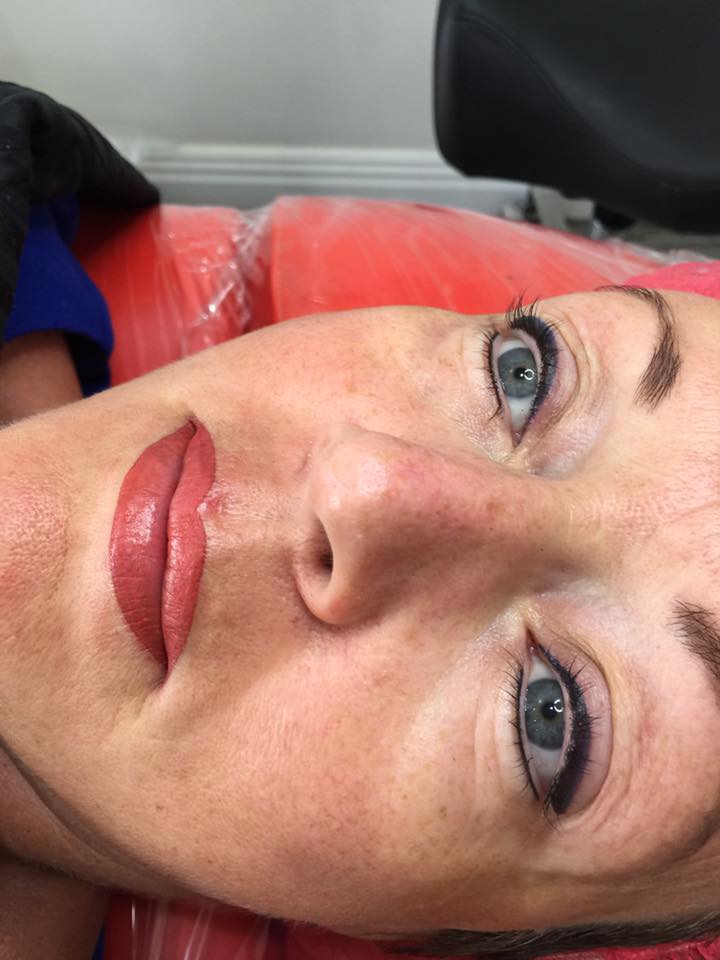Permanent makeup lips by Lorraine Thompson using Toasted Coral, showcasing a smooth application with a warm and natural coral finish.
