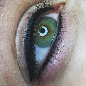 Permanent eyeliner tattoo using Aqua Ultra Black pigment by Virginia Schlesinger.