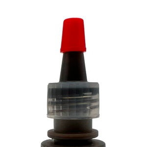 Individually packaged disposable PMU ink caps with red bases, shown in clear sterile packaging on a white background, used for holding pigment during permanent makeup procedures.