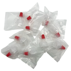 Individually packaged disposable PMU ink caps with red bases, shown in clear sterile packaging on a white background, used for holding pigment during permanent makeup procedures.